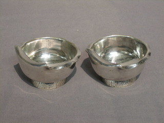A pair of Dresser style silver plated circular salts 2" by Hewkin & Heath