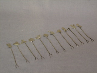 12 various Continental silver cocktail sticks