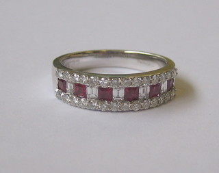 An 18ct white gold half eternity ring set 6 square cut rubies surrounded by diamonds (approx 0.66/0.56ct)