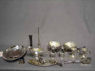 A silver plated sauce boat, 2 roll top butter dishes and other plated items