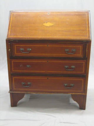 An Edwardian inlaid mahogany bureau, the fall front revealing a well fitted interior above 3 long drawers 30"