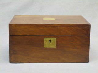 A Victorian walnut writing slope, the lid inset a brass panel 12"