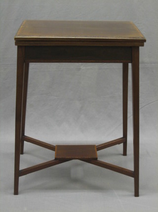 A rectangular Edwardian mahogany card table with inlaid and crossbanded top, raised on square tapering supports with undertier 20"