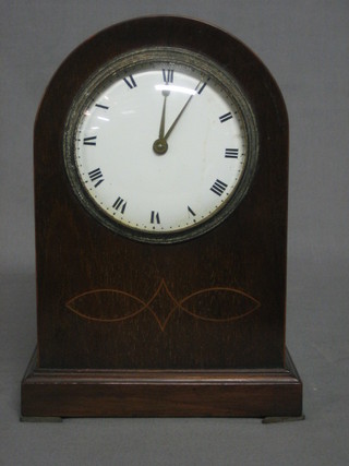An Edwardian 8 day bedroom timepiece with enamelled dial and Roman numerals contained in an inlaid mahogany case