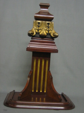 A mahogany clock bracket with fluted and Corinthian capital decoration 14" x 9"