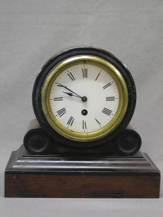 A 19th Century mantel clock with enamelled dial and Roman numerals contained in a mahogany case