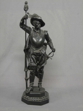 A 19th Century spelter figure of a standing cavalier with halbert  (halbert head f and spur to light boot f) 24"