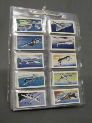 A collection of various Mills cigarette cards