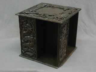An Eastern square carved hardwood revolving bookcase 13"
