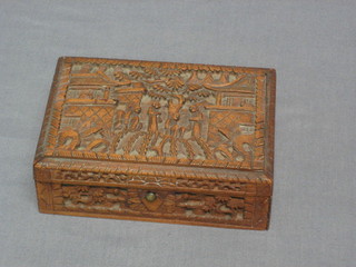 A carved Eastern box with hinged lid 4"