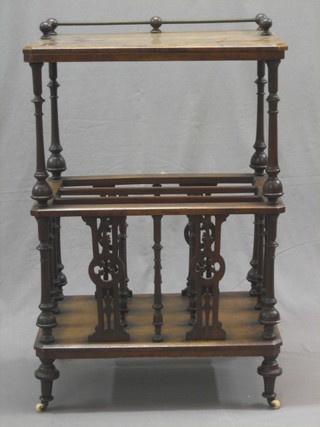 A Victorian figured walnut what-not Canterbury, the upper section with brass railed gallery above a 3 division Canterbury with bobbin work decoration 23"