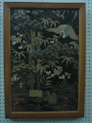 A Japanese embroidered picture depicting a turtle and stork amidst trees 20" x 13"