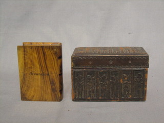 An olive wood trinket box in the form of a book 4" and an Eastern hardwood and embossed leather bound cigarette box with hinged lid 5"