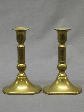 A pair of 19th Century brass candlesticks with ejectors 7"