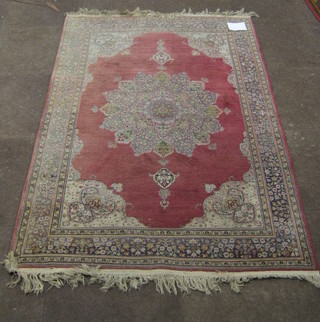 A fine quality Persian rug with brown ground and medallion to the centre 72" x 49"    