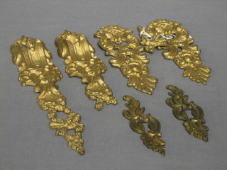 2 gilt metal escutcheons together with 5 various pieces of gilt metal furniture mount   