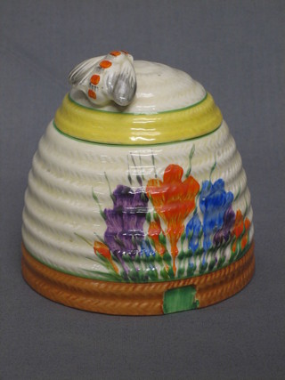 A Clarice Cliff Crocus pattern preserve jar and cover 5"