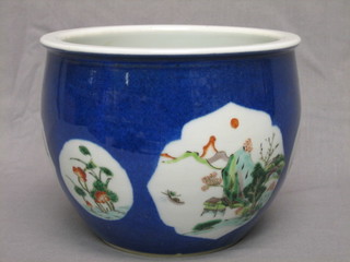 A Japanese blue porcelain jardiniere with panel floral decoration 7"