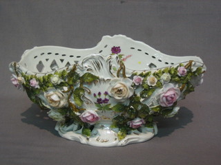 A 19th Century "Meissen" pierced boat shaped basket with floral encrusted decoration, the base marked 135 10"