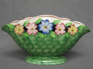 A green glazed Malingware boat shaped vase 12"