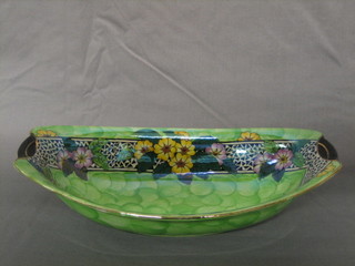 A Malingware boat shaped bowl (cracked) 11" together with 3 Malingware boat shaped dishes 10 1/2"