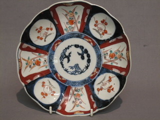 A 19th Century Japanese Imari porcelain with lobed body and panelled decoration 8 1/2"
