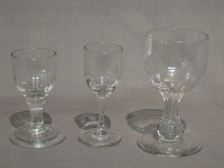 An 18th Century cordial glass the stem with faceted design, another glass with folded foot and 1 other antique glass