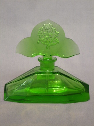An Art Deco faceted green glass scent bottle and stopper, the stopper engraved flowers (slight chip to stopper and base) 6"