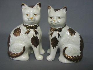 A pair of 19th Century Staffordshire figures of seated cats 8"
