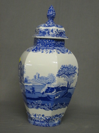 A 20th Century octagonal shaped Spode Italian blue and white urn and cover, the base marked Spode England