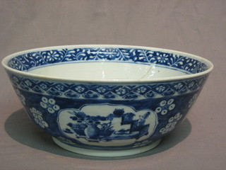 An Oriental blue and white porcelain bowl, the base with 4 character figure mark 10" cracked