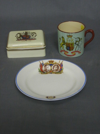 A  square trinket box to commemorate the Coronation of HM The Queen 1953 4", a circular pottery plate to commemorate the Coronation of George VI and an Elizabeth II Coronation mug 