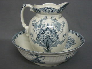 A blue and white patterned jug and wash bowl