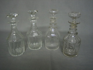 A pair of Georgian ring neck decanters and stoppers 8", 2 other decanters and stoppers 9" (4)