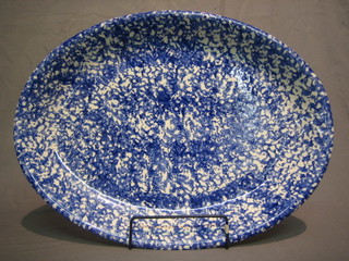 A blue glazed oval pottery meat plate 19"