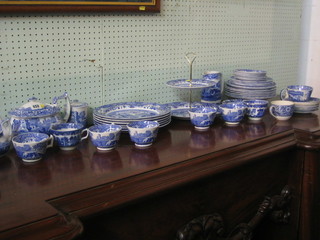 A large collection of Copeland Spode blue and white Italian tableware comprising jugs, preserve jar, teapot, cream jug, sugar bowls, tea cups and saucers etc