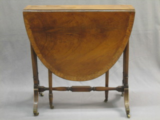 A 19th Century bleached mahogany oval Sutherland table with crossbanded top, raised on turned supports ending in brass caps and castors 26"