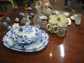 2  19th Century blue and white meat plates and a matching tureen and cover, a Japanese Imari vase 6", 2 cut glass decanters, 4 Wedgwood Father's mugs 1977 - 1980, a Wedgwood American Bi-centenary mug, a collection of Wedgwood eggs and stands, 2 blue and white serving plates with matching vegetable tureen and cover, a brass candle stick converted to a lamp other decorative items etc