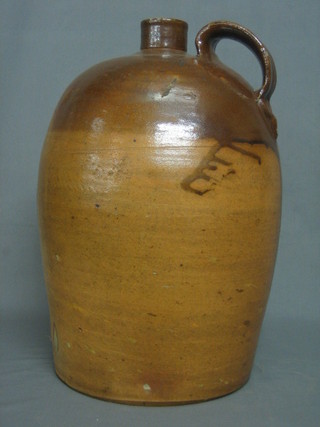 A large brown glazed flagon 20"