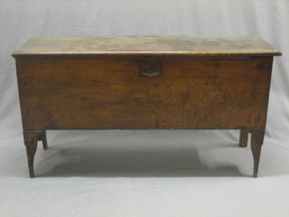 An 18th Century oak coffer of panelled construction 44" (old repair to back leg"
