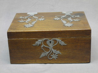 An Eastern oak trinket box with hinged lid with pressed metal hinges in the form of chrysanthemums 10 1/2"