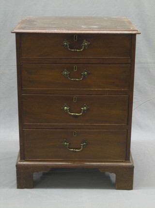 A 19th Century pedestal mahogany chest with crossbanded top, fitted 4 long drawers 21"