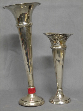 A silver trumpet shaped vase 11" (f) and 1 other silver vase 8" (dented)