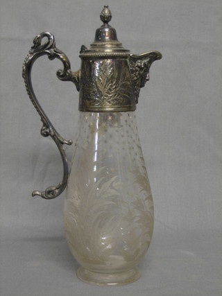 An Edwardian etched glass claret ewer with silver plated mounts
