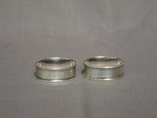 2 oval silver napkin rings 