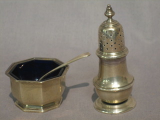 A Georgian style silver pepper with Jubilee Mark, London 1934 4" and an octagonal silver salt