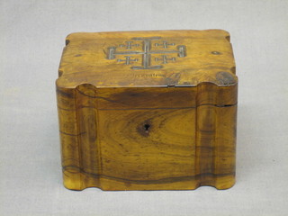 A 19th Century shaped olive wood tea caddy the hinged lid carved a Jerusalem cross 6" (slight blemish to front right hand corner)
