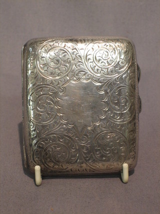 A silver cigarette case with engraved decoration Birmingham 1925, 2 ozs