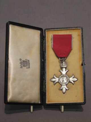 A Most Excellent Order of the British Empire member's second type breast badge, civil division, cased
