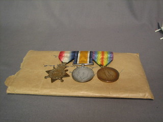A group of 3 medals to J8636 H Ross Able Bodied Royal Navy, comprising 1914-15 Star, British War medal and Victory medal together with 2 black and white photographs of the recipient and various papers relating to service